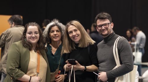 4 people smiling at the photographer during EXPOELEARNING 2023